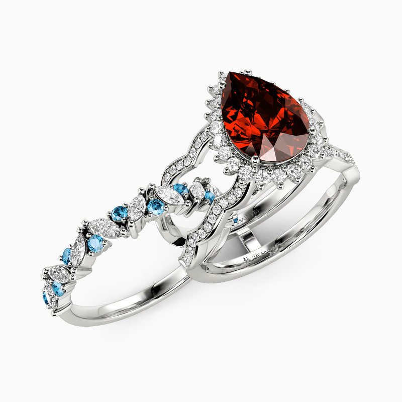 "Call of the Ocean" Pear Cut Bridal Set