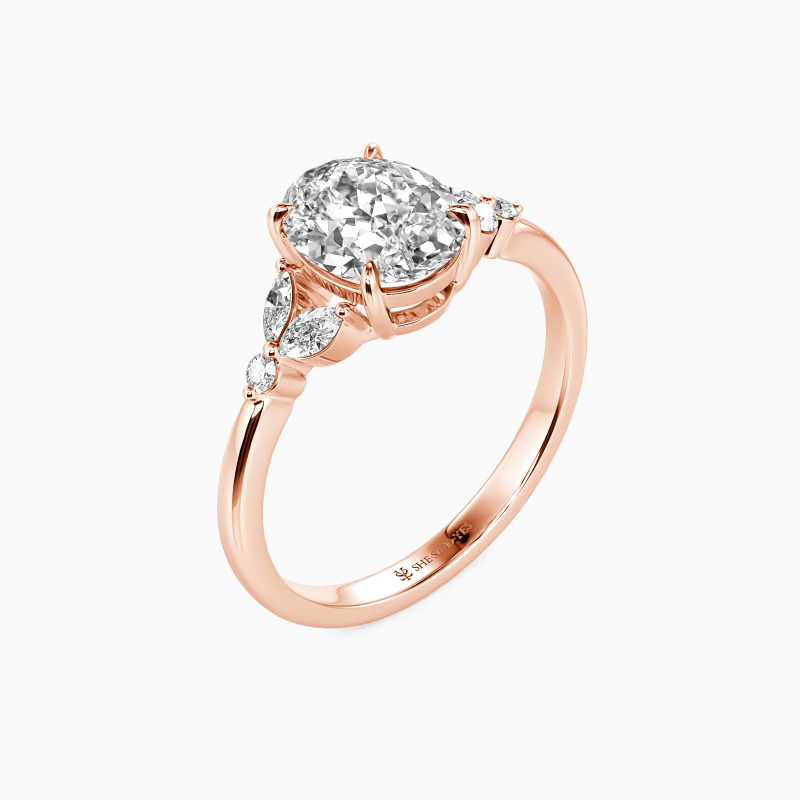 "Love Is All Around" Oval Cut Side Stone Engagement Ring