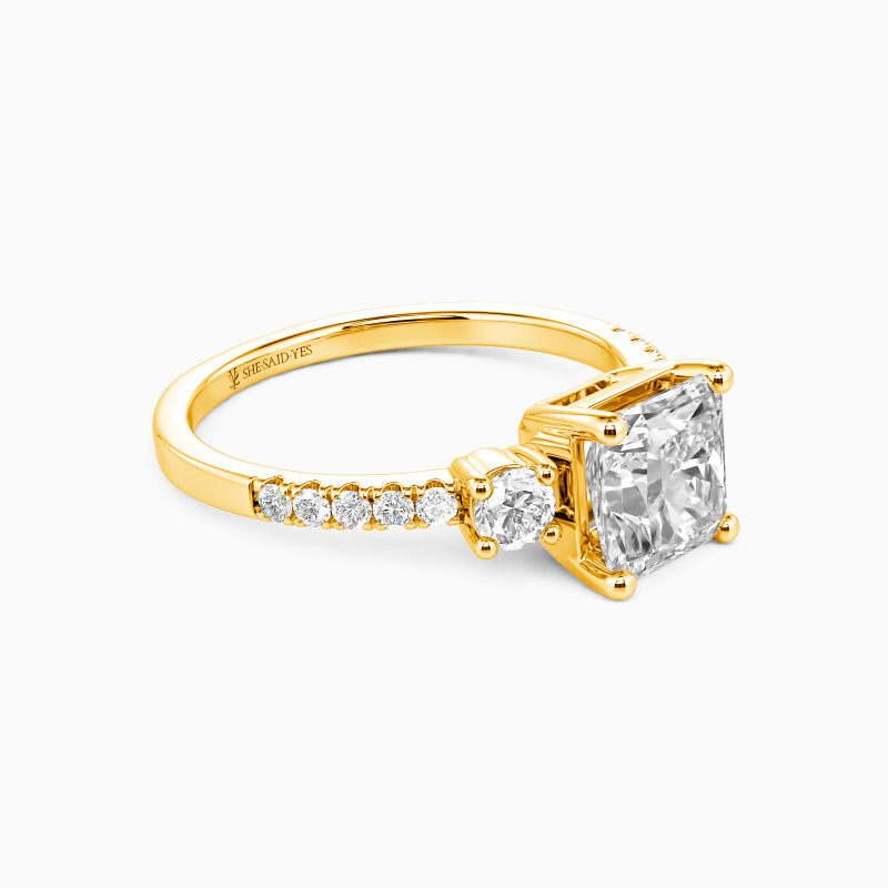 "Our Unwritten Chapter" Radiant Cut Three Stone Engagement Ring