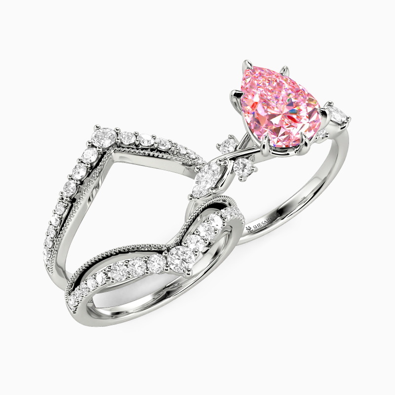 "The Serendipitous Sparkle" Pear Cut Bridal Set