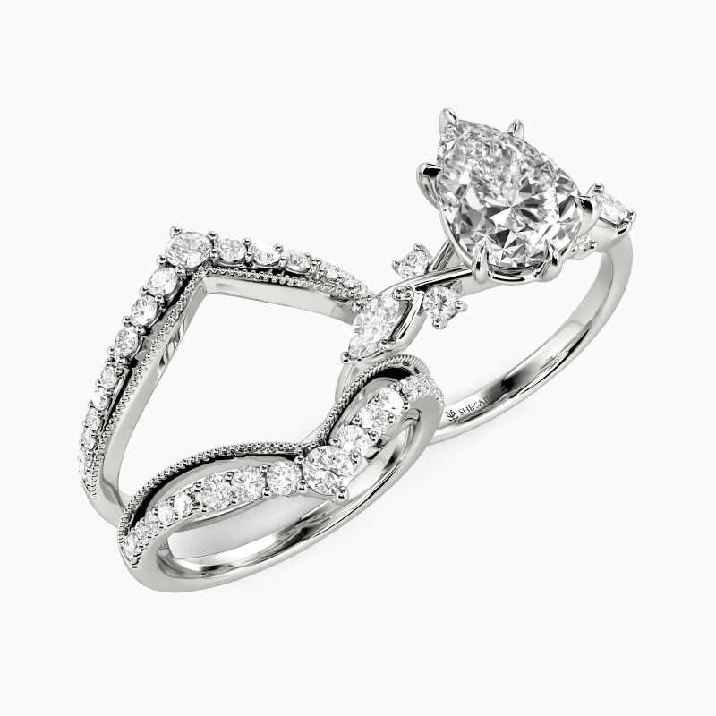 "The Serendipitous Sparkle" Pear Cut Bridal Set