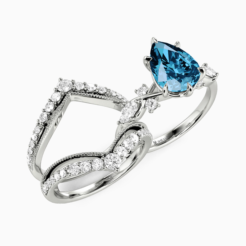 "The Serendipitous Sparkle" Pear Cut Bridal Set