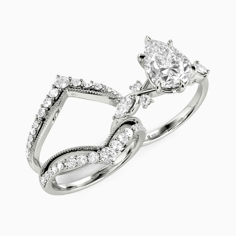 "The Serendipitous Sparkle" Pear Cut Bridal Set