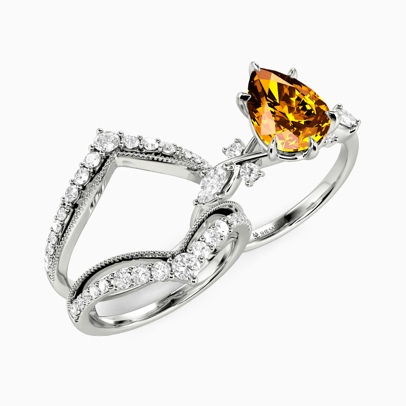 "The Serendipitous Sparkle" Pear Cut Bridal Set