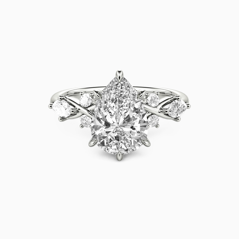 "The Serendipitous Sparkle" Pear Cut Side Stone Engagement Ring