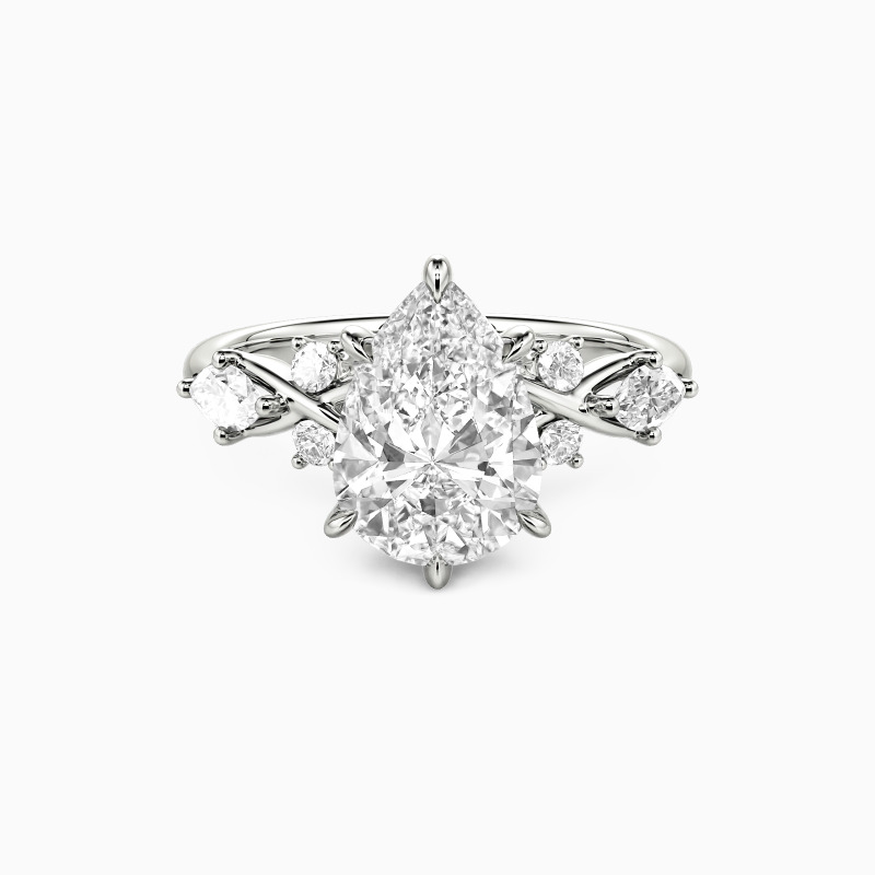 "The Serendipitous Sparkle" Pear Cut Side Stone Engagement Ring