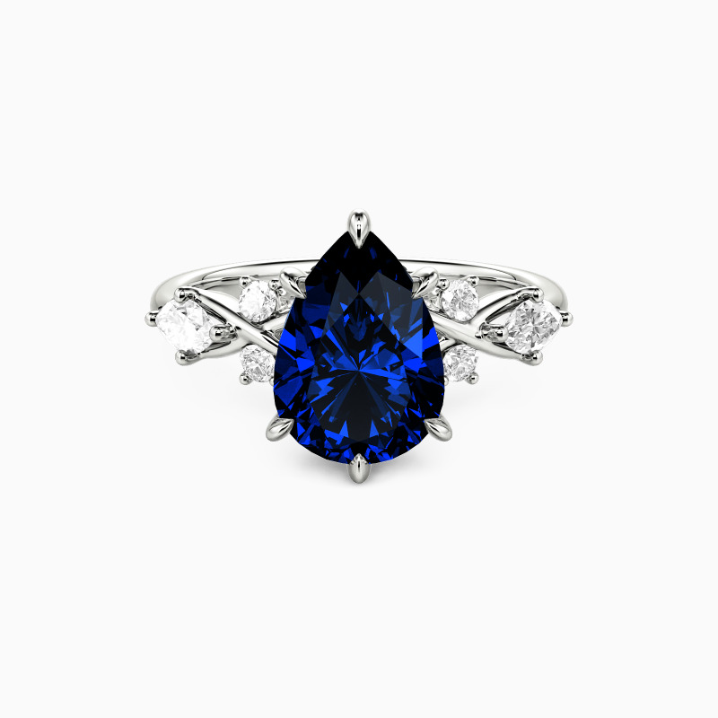 "The Serendipitous Sparkle" Pear Cut Side Stone Engagement Ring