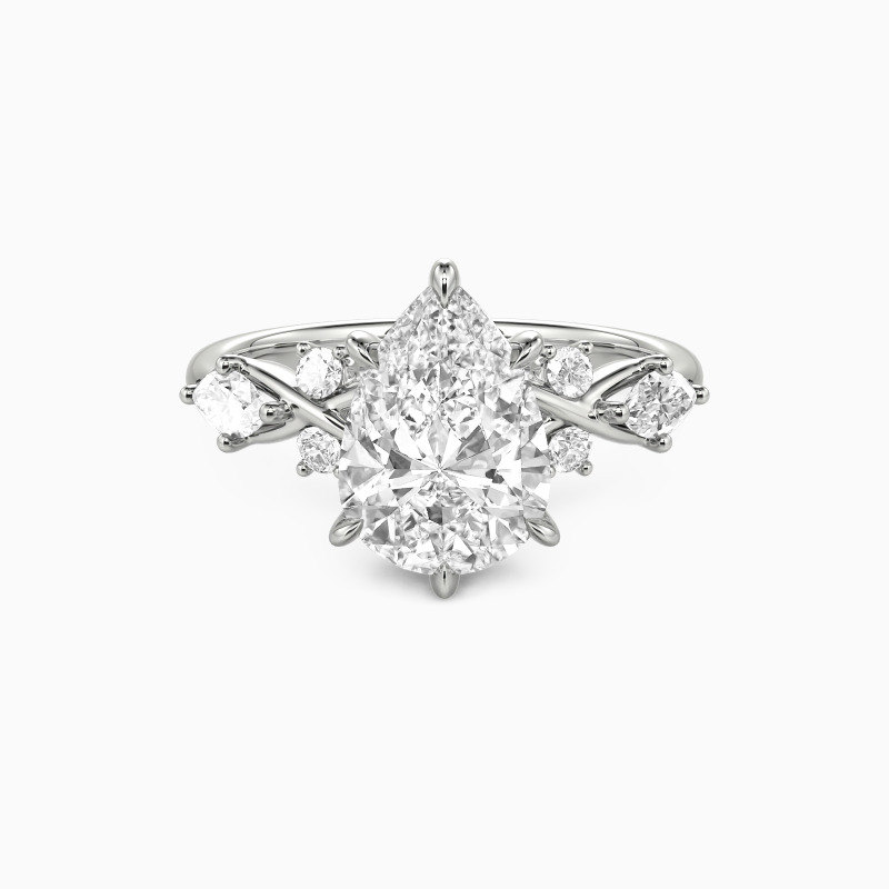 "The Serendipitous Sparkle" Pear Cut Side Stone Engagement Ring