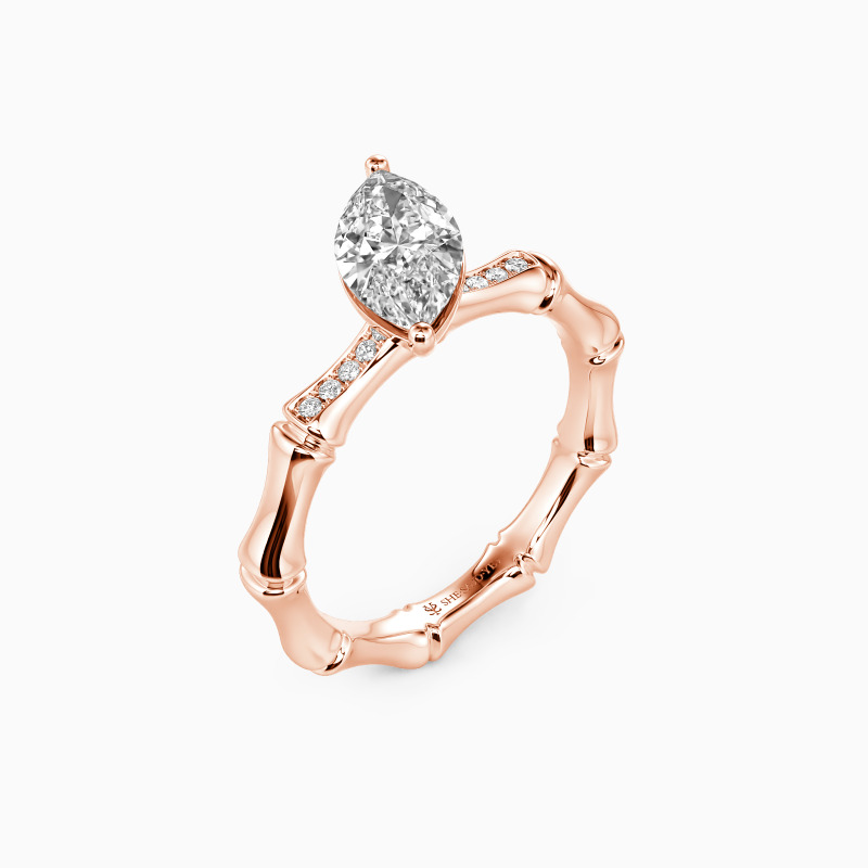 "Virtue Of Love" Marquise Cut Side Stone Engagement Ring