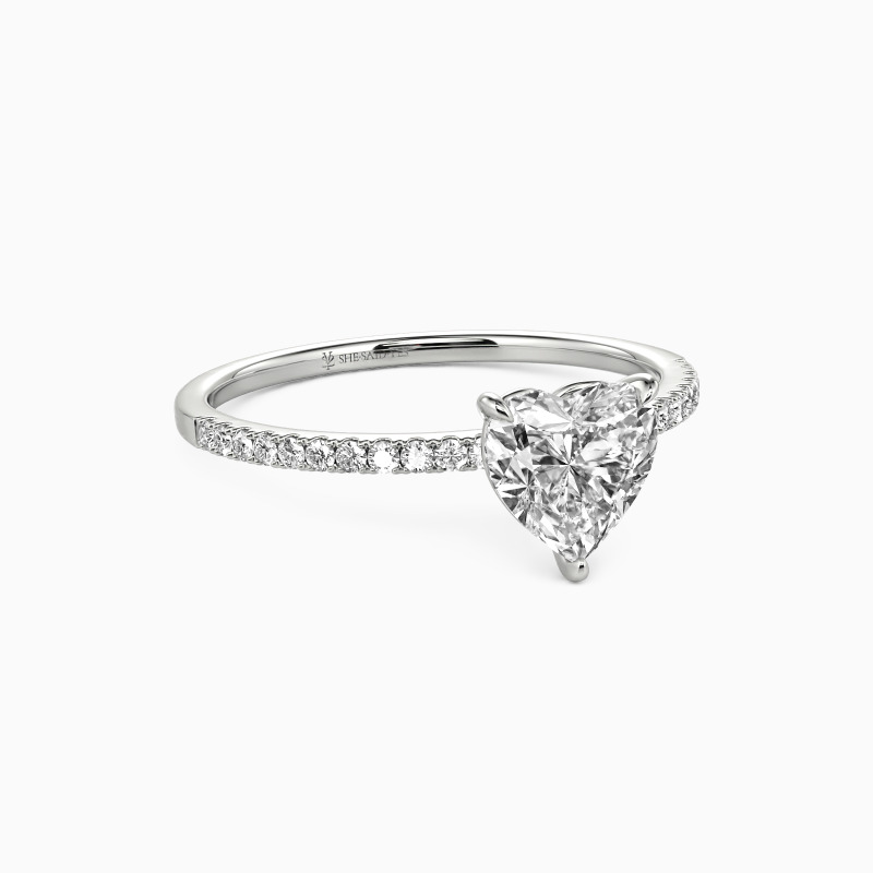 "You're Magical" 0.8ct Heart Cut Side Stone Engagement Ring