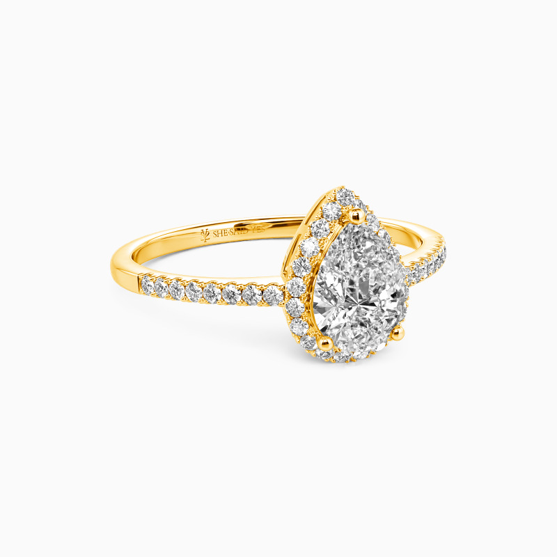 "Wange an Wange" 1 Karat Tropfen-Schliff Halo-Verlobungsring