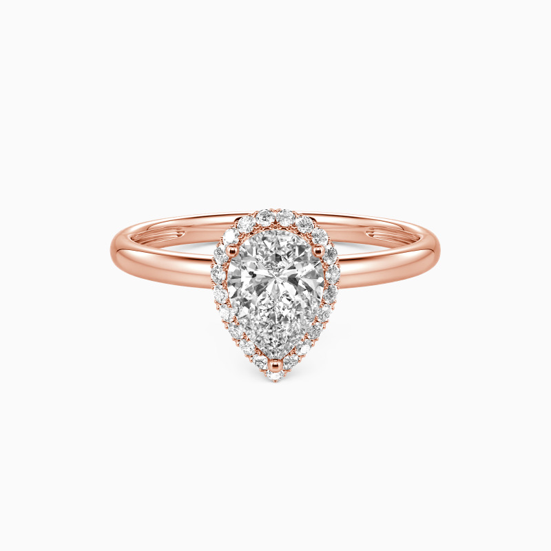 "Amour Courageux" Pear Cut Halo Bague de fiançailles