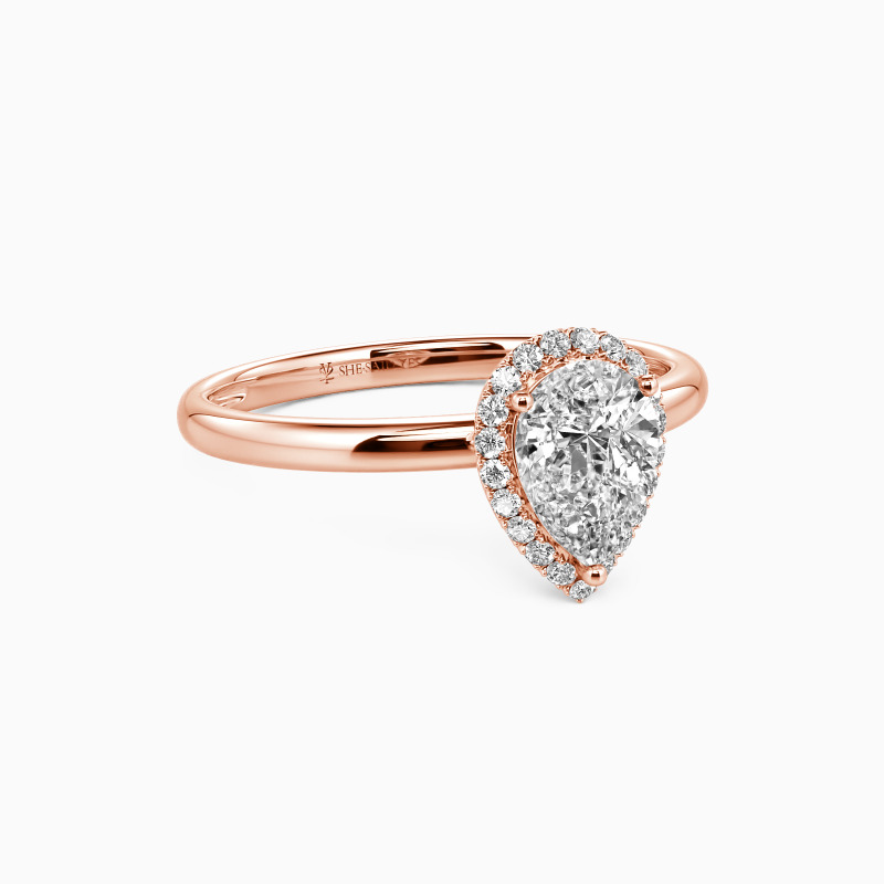"Brave Love" Pear Cut Halo Engagement Ring