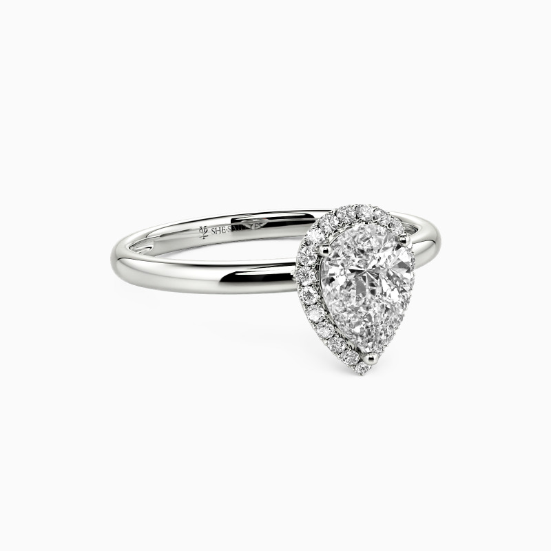 "Brave Love" Pear Cut Halo Engagement Ring