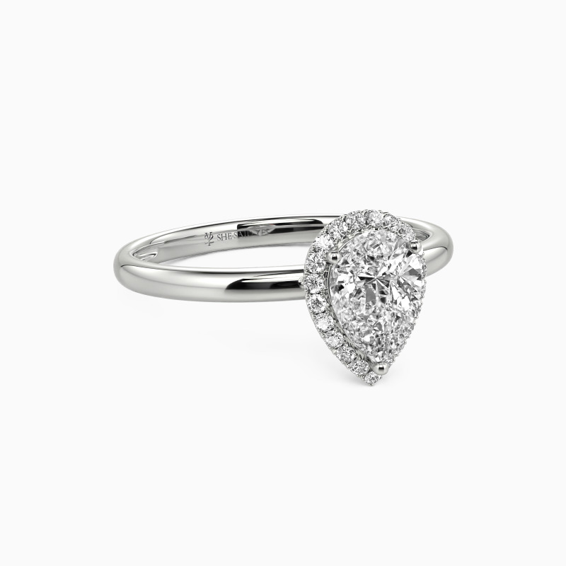 "Brave Love" Pear Cut Halo Engagement Ring