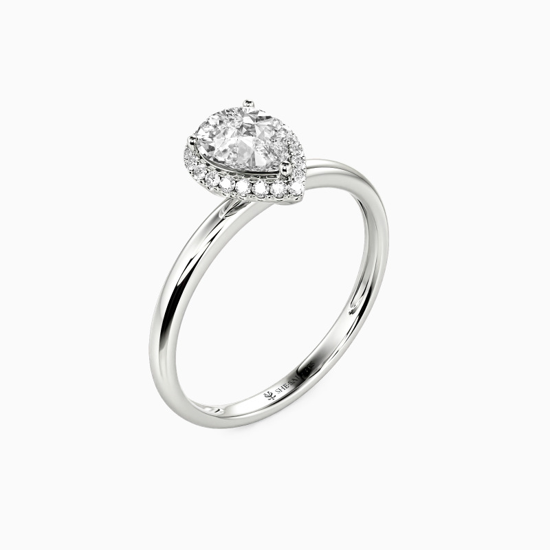 "Brave Love" Pear Cut Halo Engagement Ring