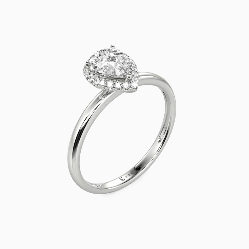 "Brave Love" Pear Cut Halo Engagement Ring
