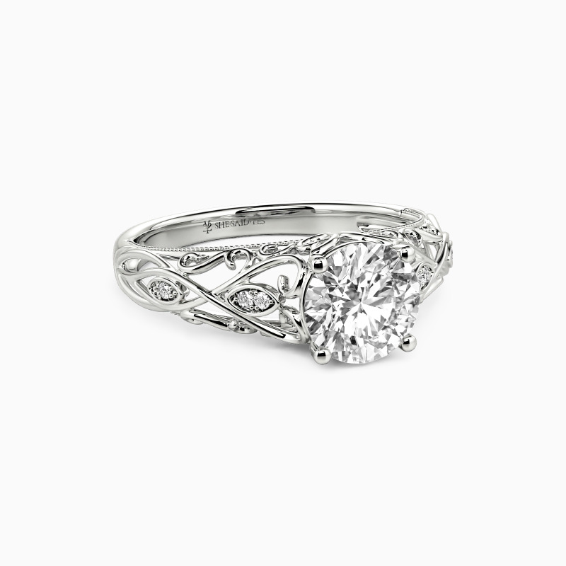 "How Sweet We Are" Round Cut Side Stone Engagement Ring