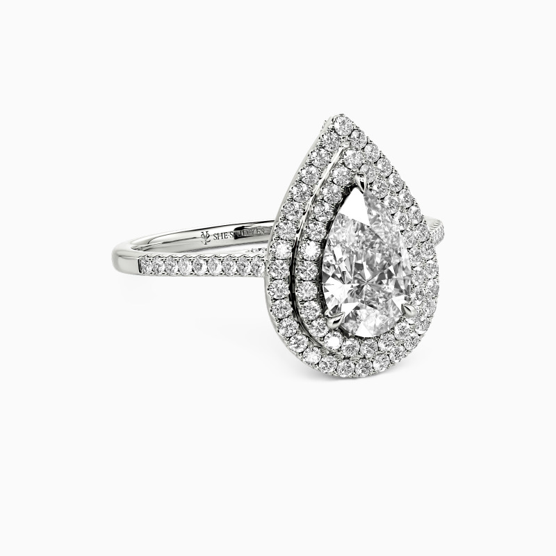 "You Are The World" 1ct Pear Cut Halo Engagement Ring