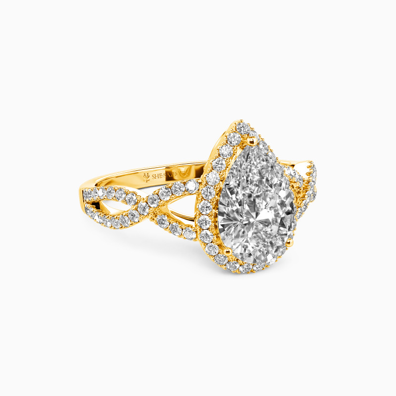 "You Are the Unique One" Pear Cut Halo Engagement Ring