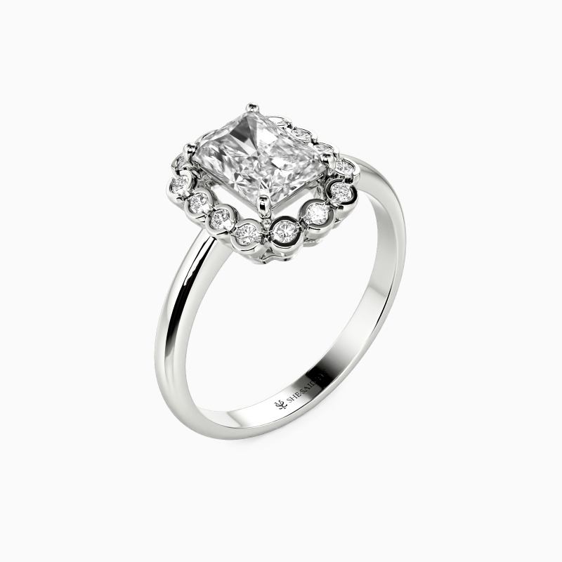 "Hopeful Future" Emerald Cut Halo Engagement Ring