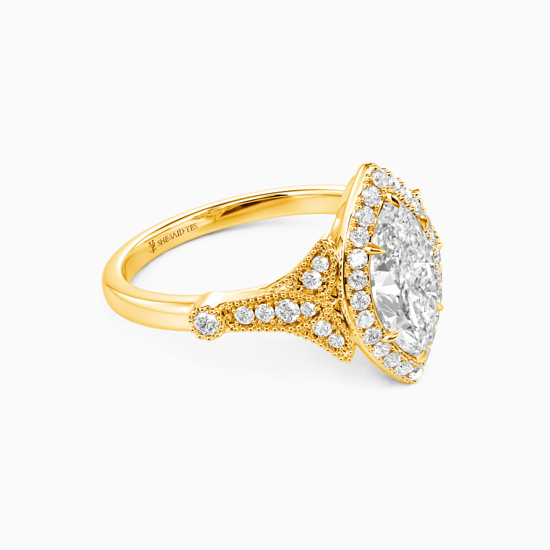 "A Thousand Golden Days" Marquise Cut Halo Engagement Ring