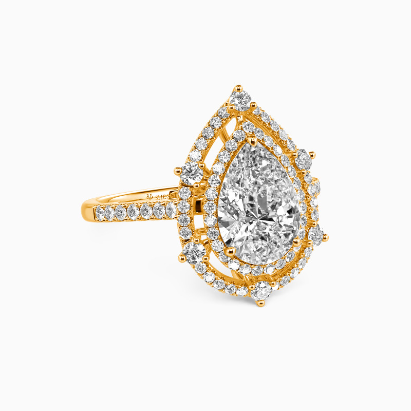 "Addicted To You" Pear Cut Halo Engagement Ring