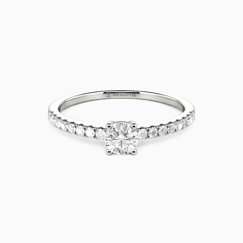 "Love is Light" 0.3ct Round Cut Side Stone Engagement Ring