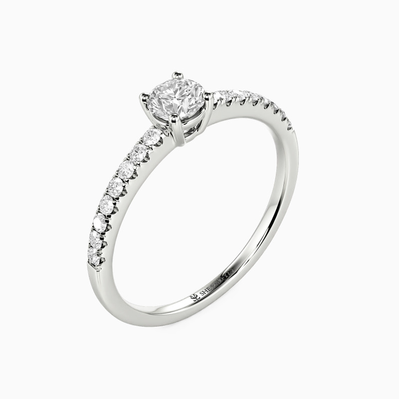 "Love is Light" 0.3ct Round Cut Side Stone Engagement Ring