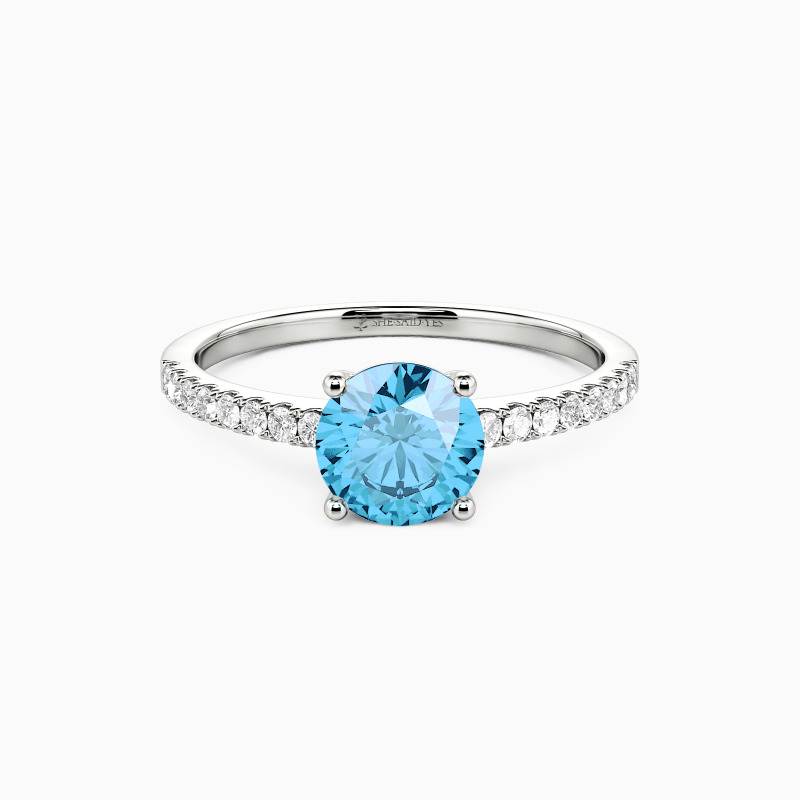 "Love Is Light" 1ct Round Cut Side Stone Engagement Ring