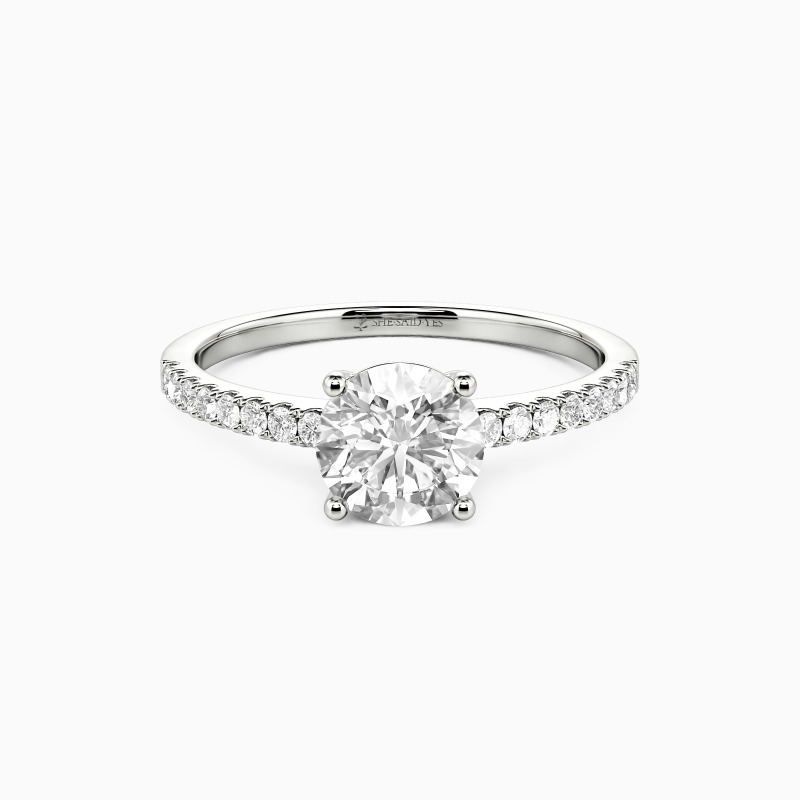 "Love Is Light" 1ct Round Cut Side Stone Engagement Ring