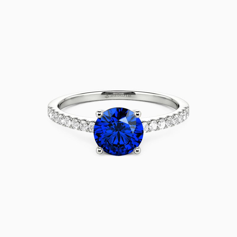 "Love Is Light" 1ct Round Cut Side Stone Engagement Ring