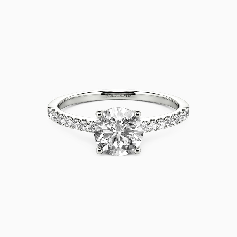 "Love is Light" 1ct Round Cut Side Stone Engagement Ring