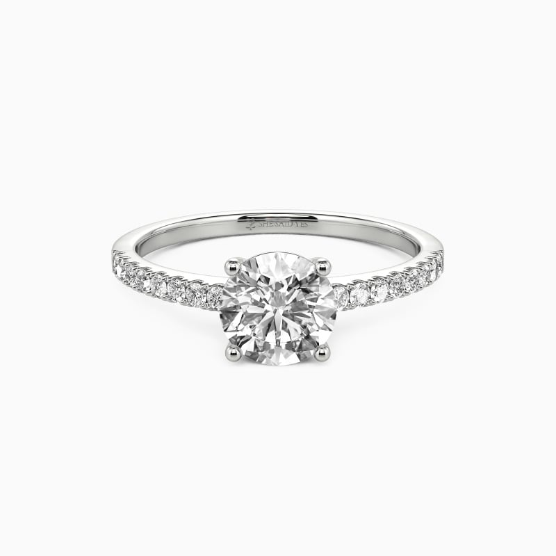 "Love is Light" Round Cut Side Stone Engagement Ring