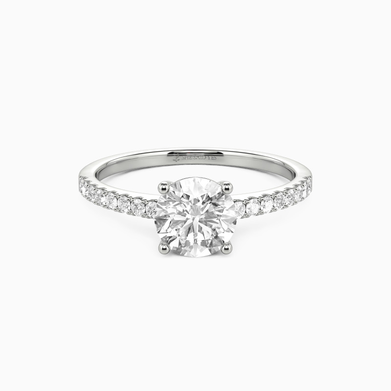 "Love Is Light" 1ct Round Cut Side Stone Engagement Ring