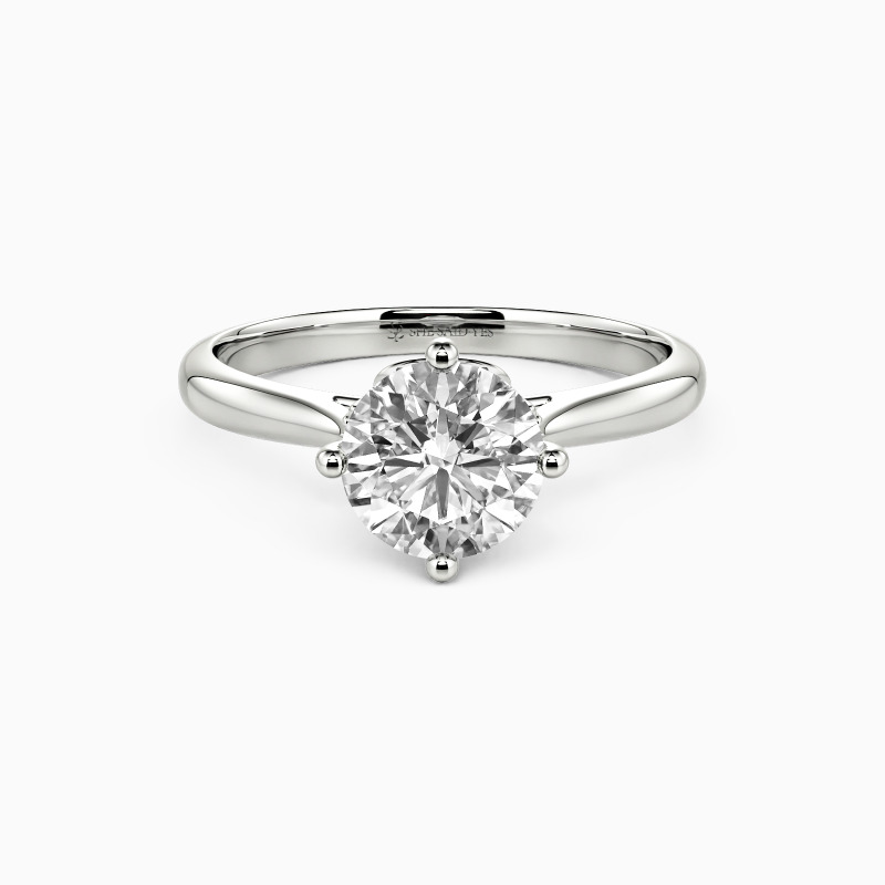 「星の心」 ラウンドカット サイドストーン付き婚約指輪