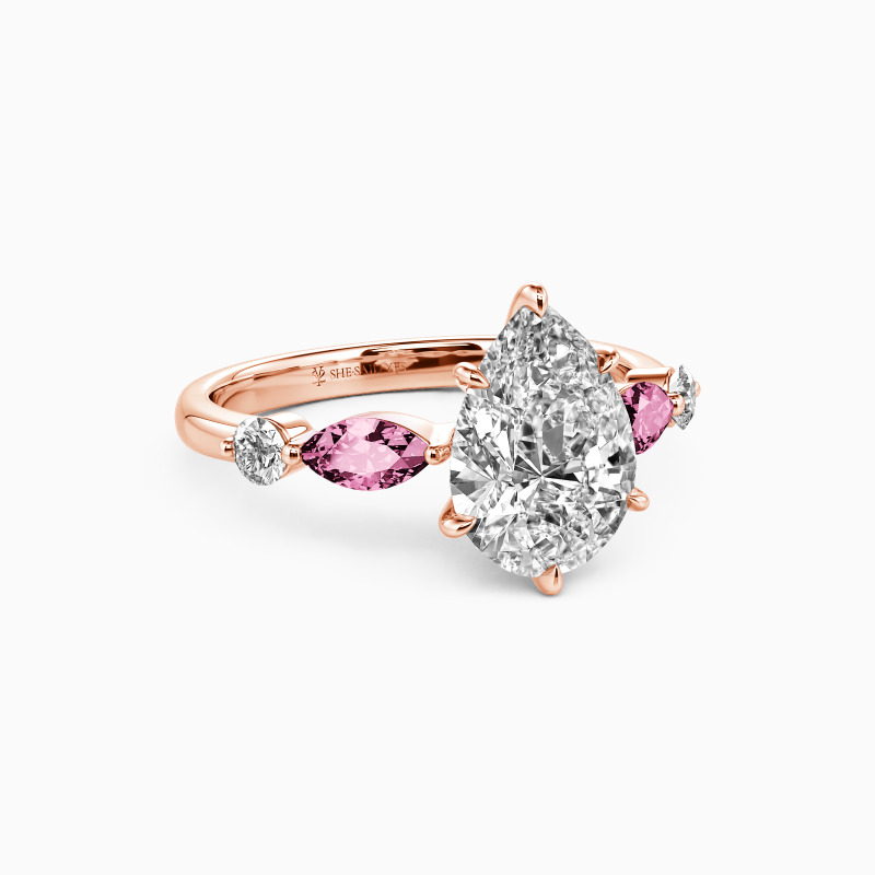 "The Portrait of Love" 1.5ct Pear Cut Side Stone Engagement Ring