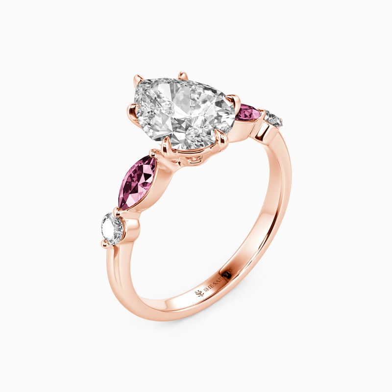 "The Portrait of Love" 1.5ct Pear Cut Side Stone Engagement Ring