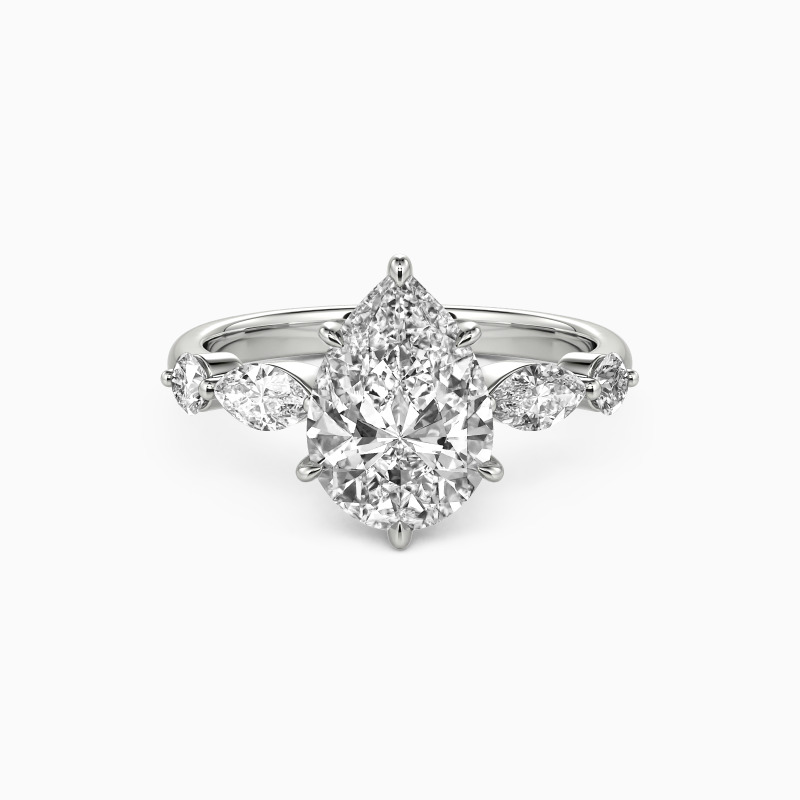 "The Portrait of Love" Pear Cut Side Stone Engagement Ring