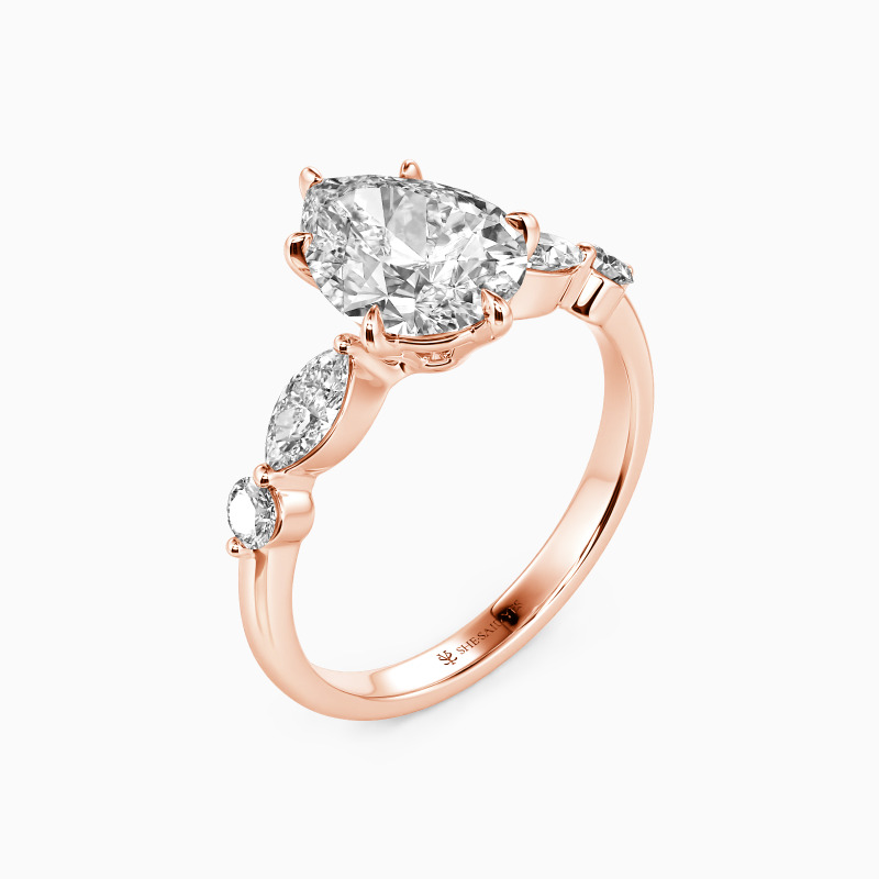 "The Portrait of Love" 2ct Pear Cut Side Stone Engagement Ring