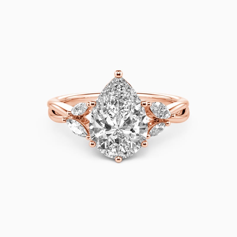 "Sun Glint" Pear Cut Side Stone Engagement Ring