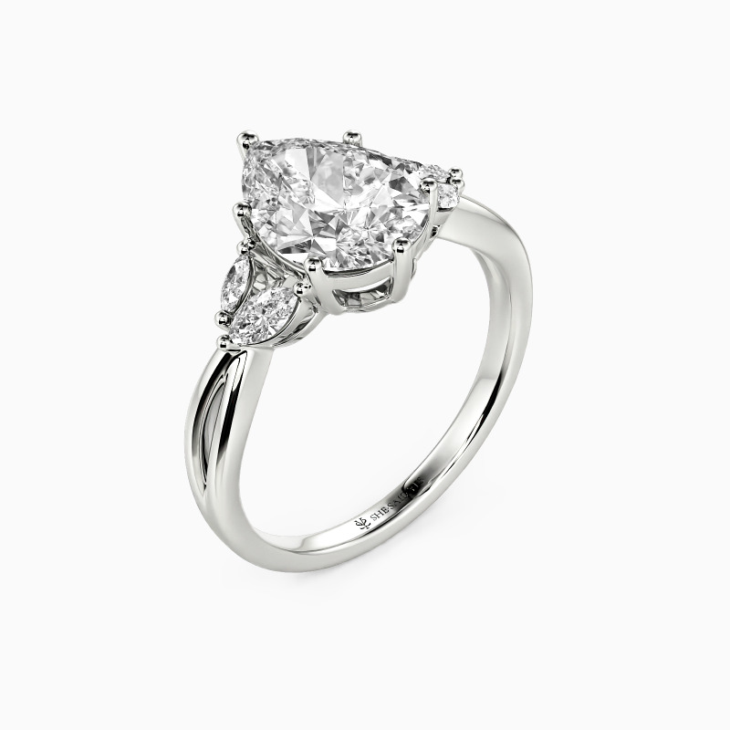 "Sun Glint" 2ct Pear Cut Side Stone Engagement Ring