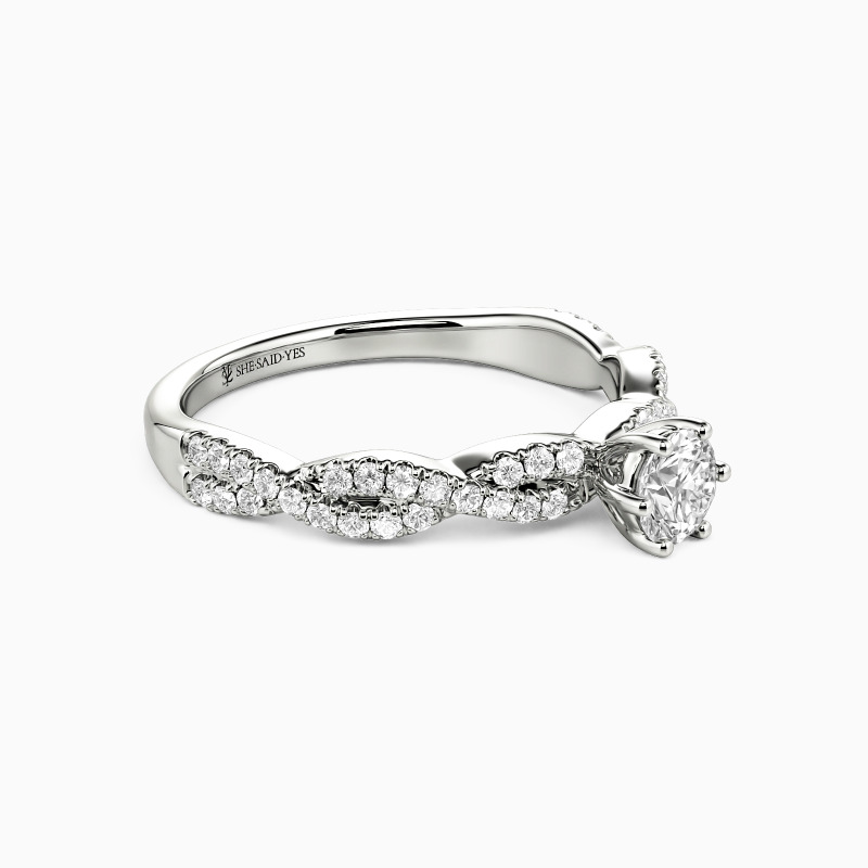 "Love Profusion" 0.5ct Round Cut Side Stone Engagement Ring