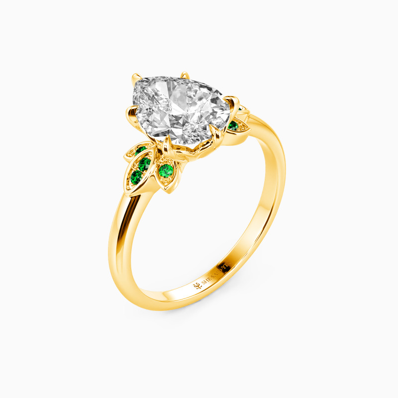 "Wings of Love" Pear Cut Side Stone Engagement Ring