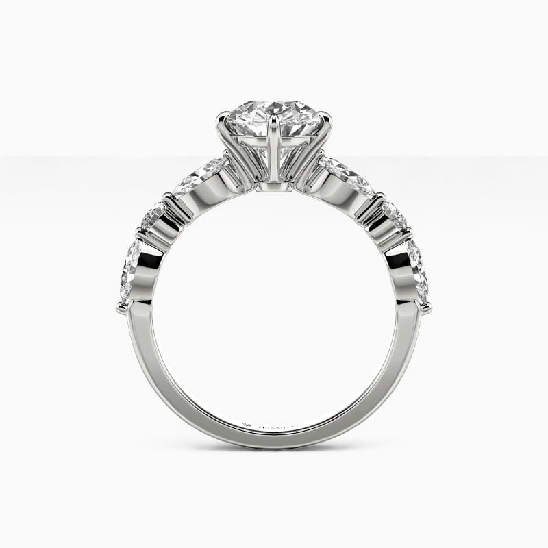 "Holy Promise" Pear Cut Side Stone Engagement Ring
