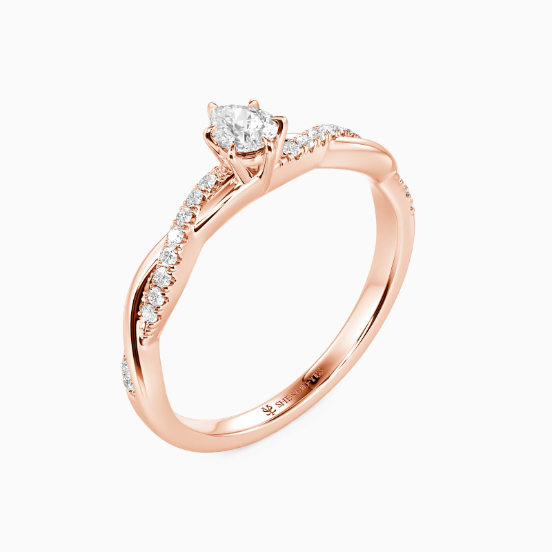 "Ehrenwort" Verlobungsring 0,8 ct Birnenschliff mit Seitensteinen