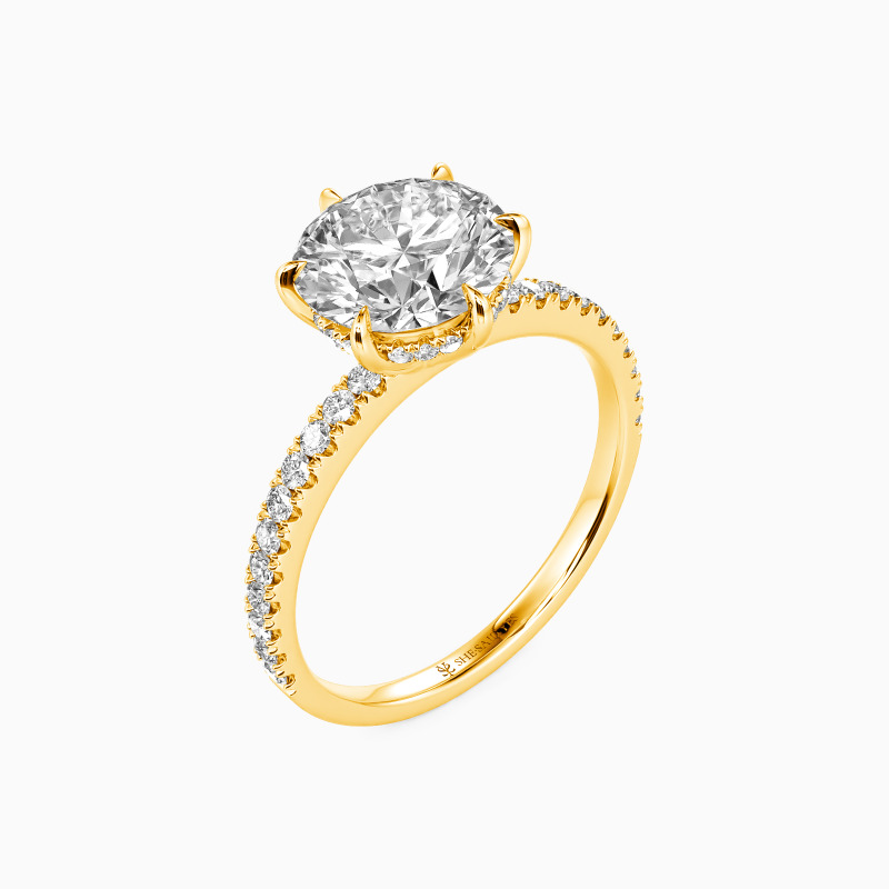 "In The Name Of Love" Round Cut Side Stone Engagement Ring