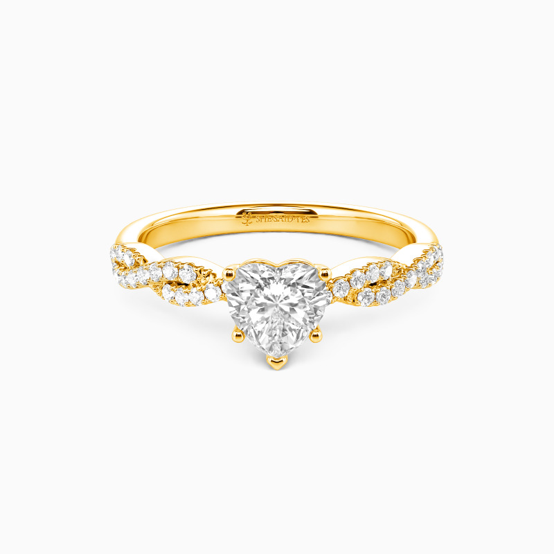 "The String Of My Heart" 0.8ct Heart Cut Side Stone Engagement Ring