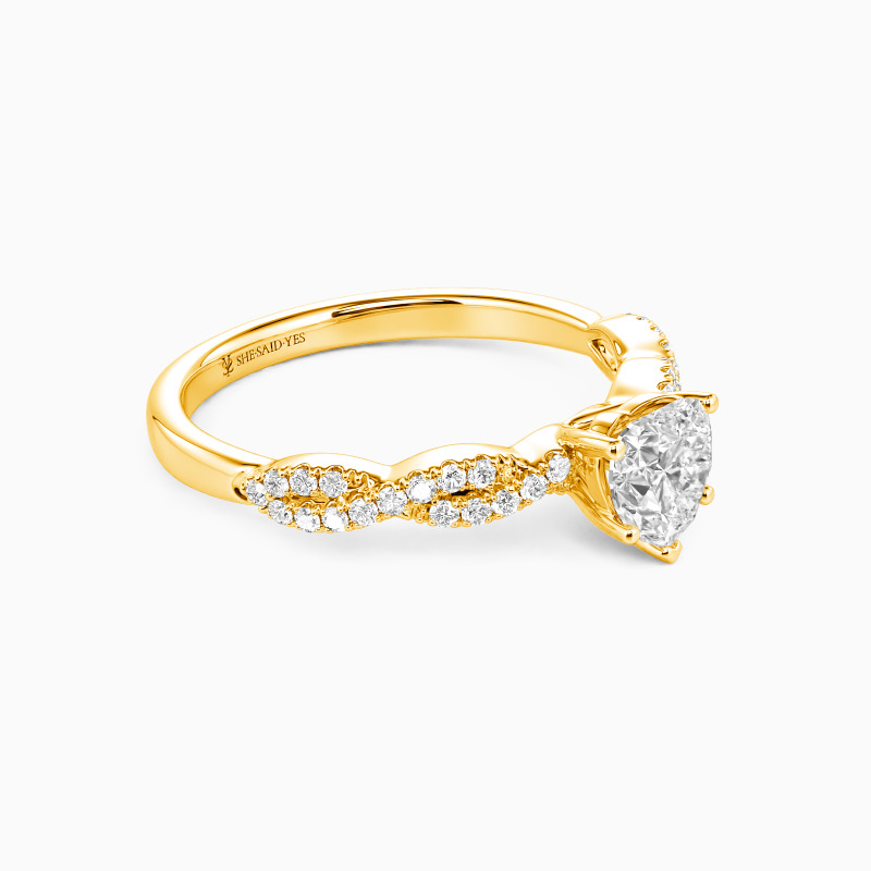 "The String Of My Heart" 0.8ct Heart Cut Side Stone Engagement Ring