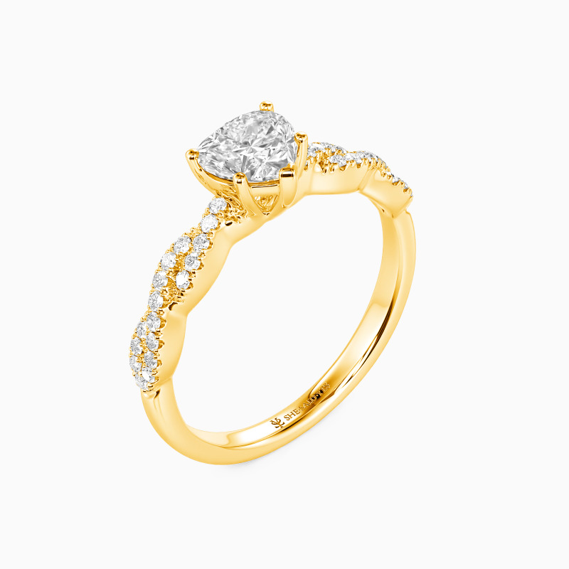 "The String Of My Heart" 0.8ct Heart Cut Side Stone Engagement Ring